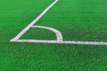 Obraz premium Corner of soccer football green grass field