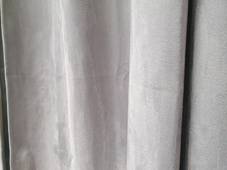 Obraz premium Gray polyester curtains, blackout curtains made from recycled material. Close-up