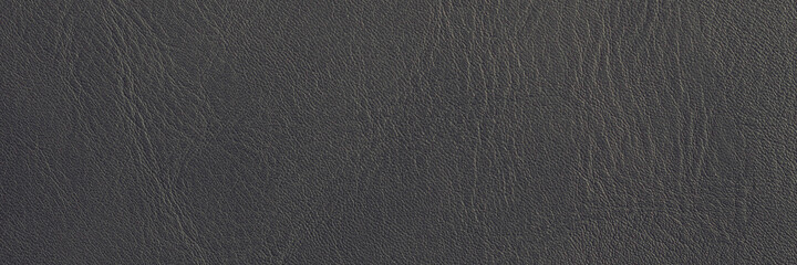 Grey leather texture background banner. Dark natural skin background.