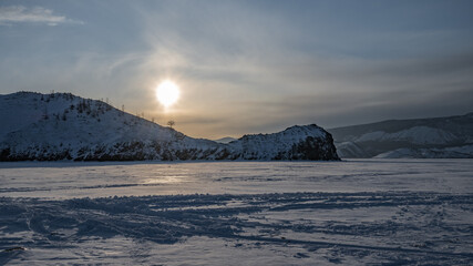 Sunset on a snow-covered lake