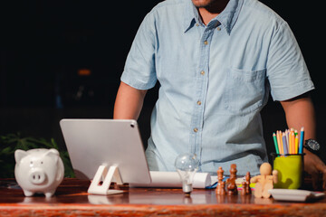 Businessmen with desks that are planning to invest in a new business At home at night
