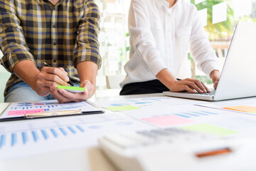 young business managers crew working with new startup project working with plan on office desk and modern digital computer