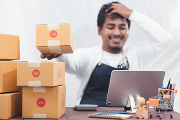 SME entrepreneurs use smartphones to contact customers Work from home to fulfill customer orders through online business websites. Parcel delivery concept
