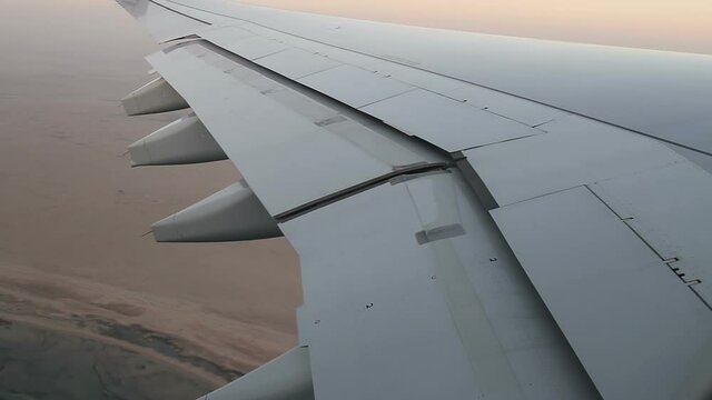 Aircraft wing, flap and aileron moving while the flight