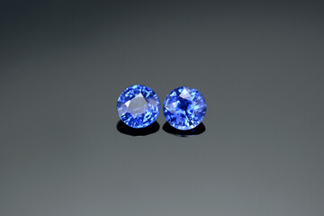 Genuine natural rich cornflower blue color round faceted calibrated matched pair Ceylon sapphire...