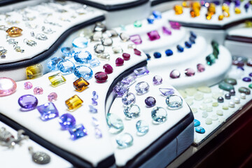 A variety of precious stones on the shelves in a jewelry store