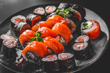sushi roll in plate on wooden table background