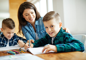 homework teaching education mother children son familiy childhood child teacher classroom