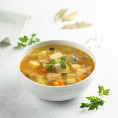 Traditional homemade salmon soup with vegetables