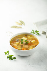 Traditional homemade salmon soup with vegetables