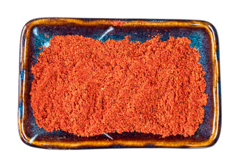 top view of paprika powder in ceramic bowl cutout