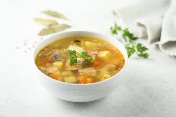 Traditional homemade salmon soup with vegetables