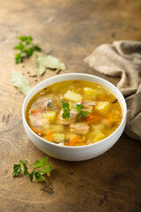 Traditional homemade salmon soup with vegetables