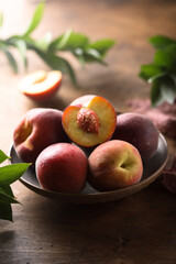 Fresh ripe peaches in a bowl
