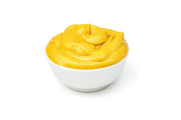 Yellow mustard sauce in white ceramic bowl isolated on white background. - obrazy, fototapety, plakaty