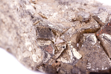 Macro mineral stone Pyrite gold on white background