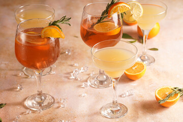 Orange christmas alcoholic beverage aperol spritz and lemonade with oranges, tangerines and...