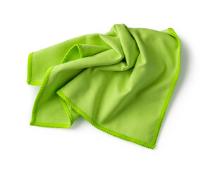 Crumpled green microfiber cloth isolated on white background. Soft microfiber napkin for cleaning objects and surfaces. Housework, cleaning and purity equipment.