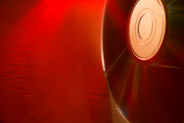 compact disc on a wooden table