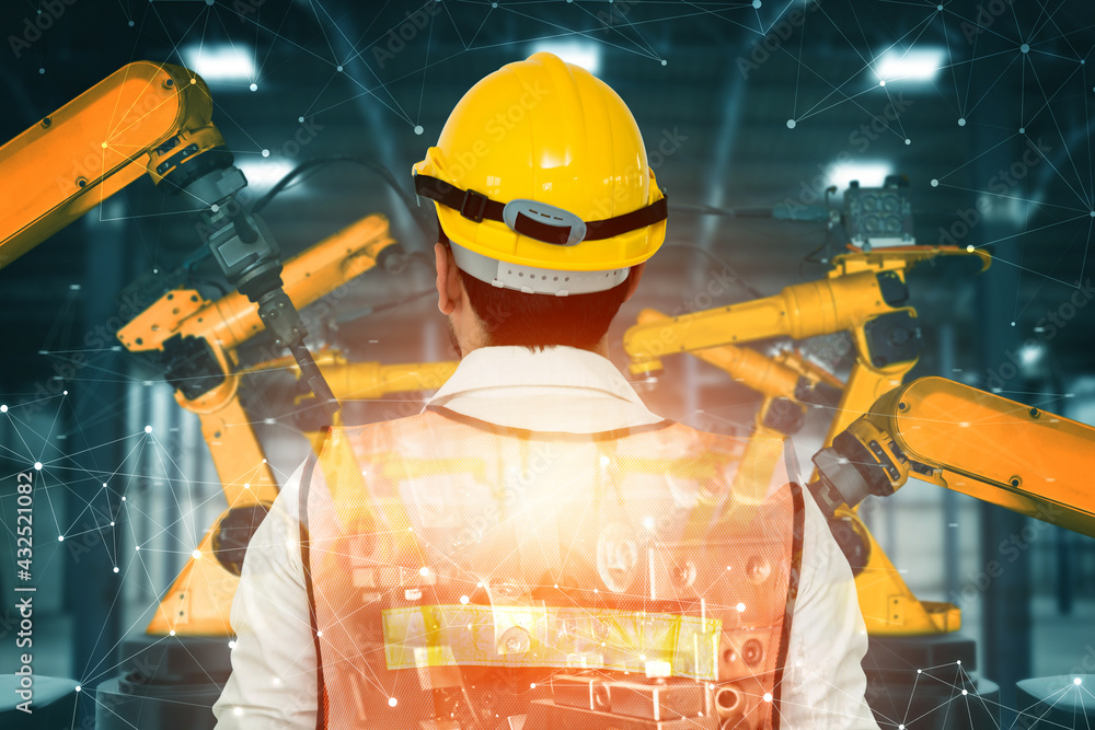 Poster mechanized industry robot arm and factory worker double exposure . concept of robotics technology fo
