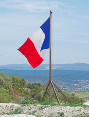 Fototapeta premium Flag of France against the blue sky