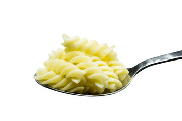 Spirelli on spoon isolated on white background