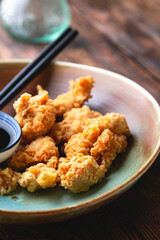 Japanese fried chicken. Fried chicken fillet pieces, breaded