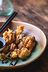 Japanese fried chicken. Fried chicken fillet pieces, breaded