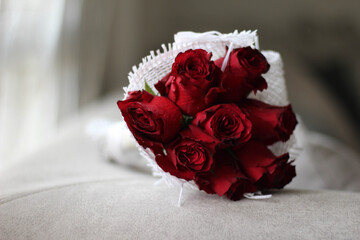 Bride Red flower bouquet in a white net