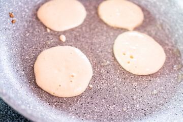 Fototapeta na wymiar Making pancakes