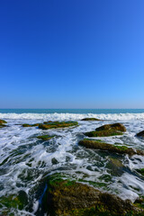 Wavy sea and blue sky. Karaburun Beach İstanbul, Turkey.