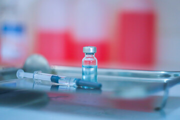 Trial vaccine coronavirus deverlopment vial dose flu shot drug needle syringe,medical concept vaccination hypodermic injection treatment disease care hospital prevention immunization illness disease.