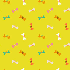 Seamless pattern with colorful bones on yellow background. Creative childish texture.