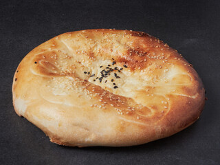 Fat man with a big belly on a dark background. Diet.