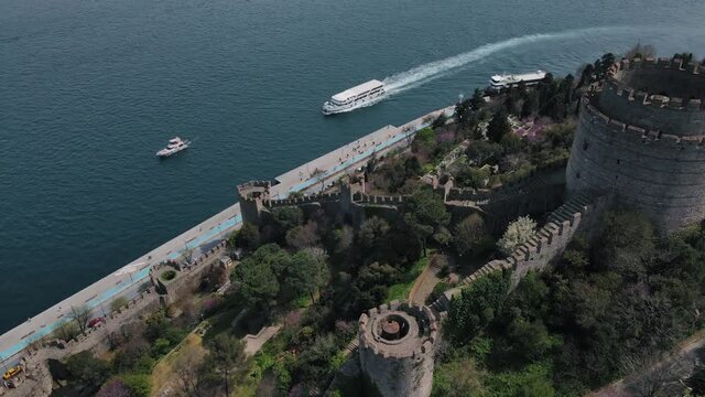 Rumeli Hisari Fortress in Istanbul. April 27 - 2021. View from the drone Full HD format. In sunny weather with a view of the Bosphorus. Rumelihisari also known as Bogazkesen Castle and Roumeli Hissar