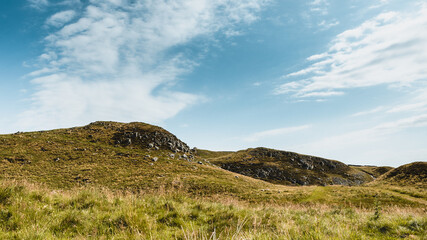 Northumberland UK: Hadrians Wall built on tall cliffs (Roman Wall) on a sunny summer day in English countryside