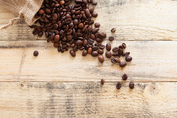 Coffee bean sack on wooden boards