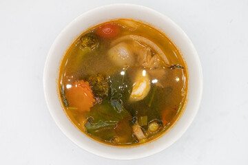 Simple Thai Tom Yum Soup in a White Bowl