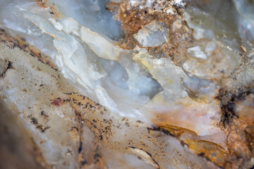 unworked, natural quartz stone. close up. background. Wall paper.