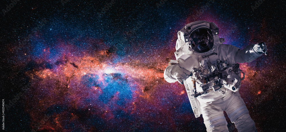 Canvas Prints astronaut spaceman do spacewalk while working for space station in outer space . astronaut wear full