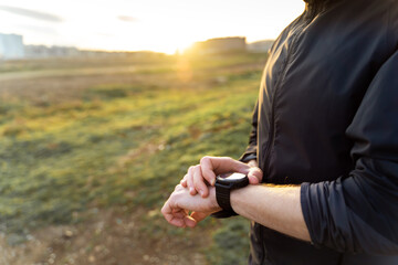 Man hands with fitness watch close up