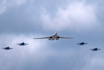 MOSCOW, RUSSIA - MAY 7, 2021: Avia parade in Moscow. su-35 and strategic bomber and missile...
