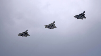MOSCOW, RUSSIA - MAY 7, 2021: Avia parade in Moscow. Sukhoi Su-57 in the sky on parade of Victory...