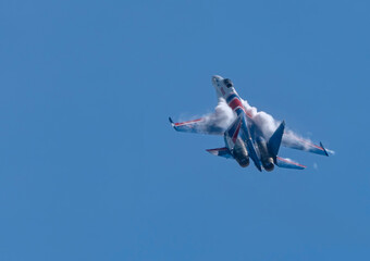 Moscow Russia Zhukovsky  Russian Knights Russkie Vityazi aerobatic team performs a demonstration flight aerobatics figures of the international aerospace salon MAKS-2019