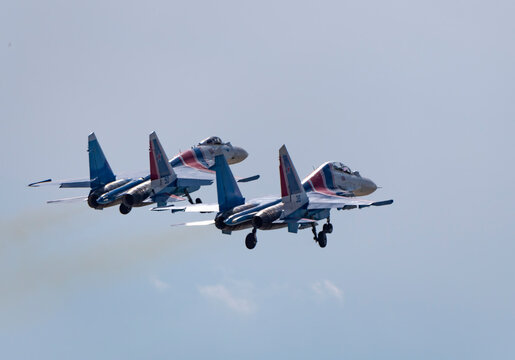 Moscow Russia Zhukovsky  Russian Knights Russkie Vityazi aerobatic team performs a demonstration flight aerobatics figures of the international aerospace salon MAKS-2019