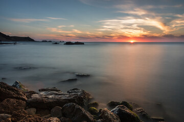 sunset over the sea and beach