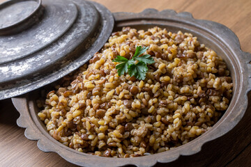 Traditional delicious Turkish foods; bulgur pilaf with green lentils (Turkish name; yesil mercimekli bulgur pilavi)