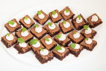 party platter with small chocolate cakes