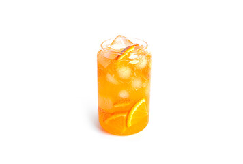 Orange drink with orange slices and ice in a glass isolated on a white background.