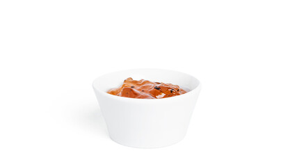 Jam in a gravy boat isolated on a white background. Pinapple jam.